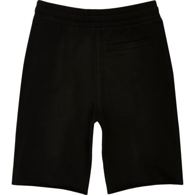 Boys black drop crotch shorts